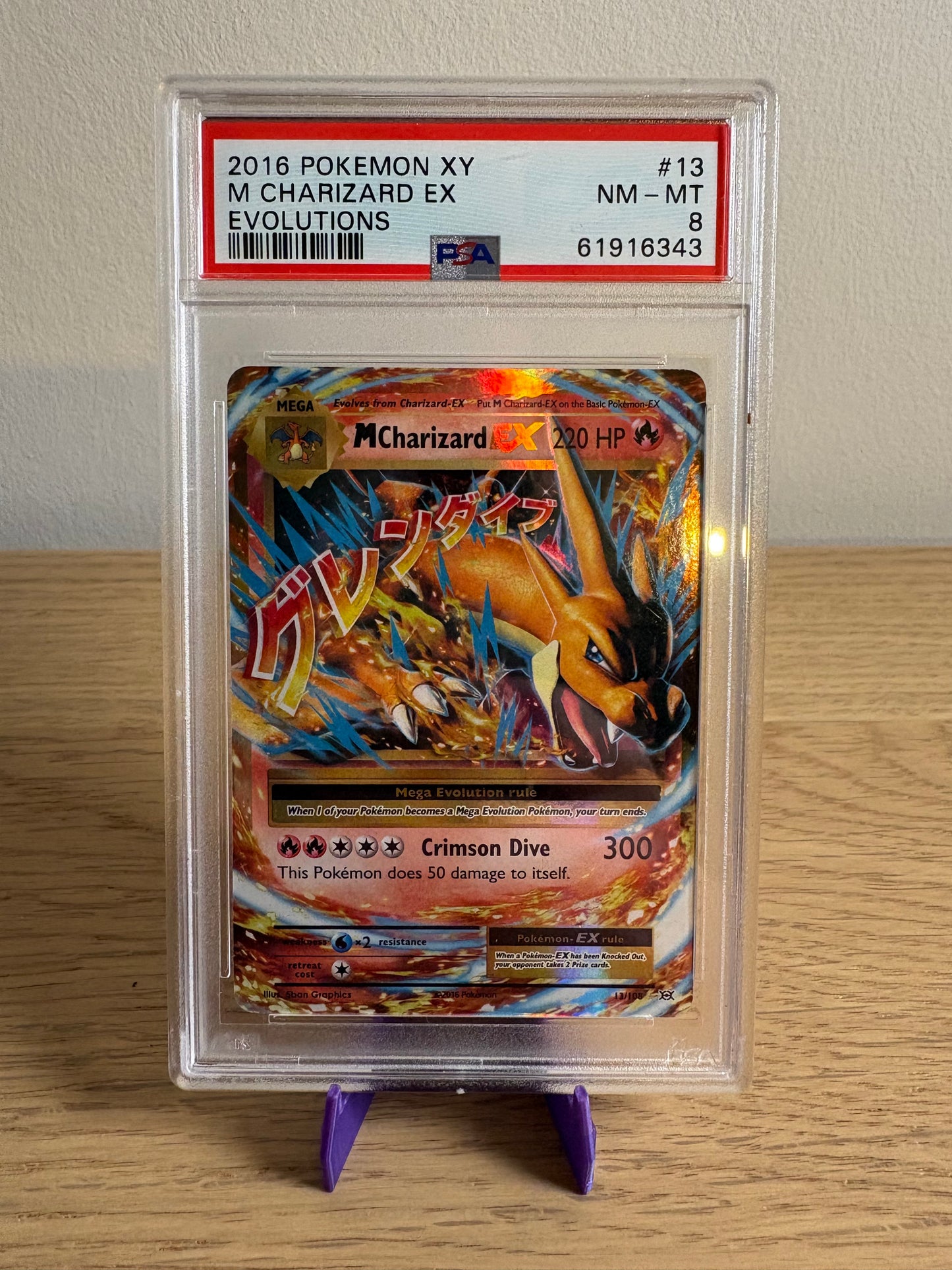 M Charizard EX #13 – Pokémon Evolutions – PSA 8